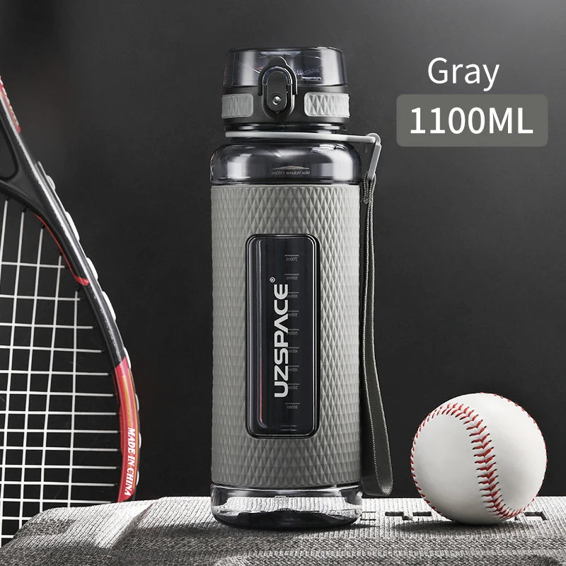 Portable Leak-Proof Sports Bottle – Made from Tritan plastic, durable, and anti-fall design, ideal for fitness and gym use.